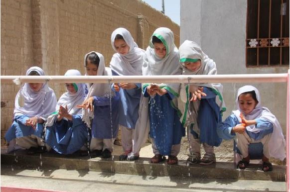 Young girls practicing hand hygiene in Pakistan