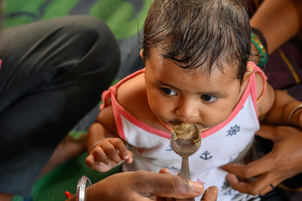 Image of a child feeding 